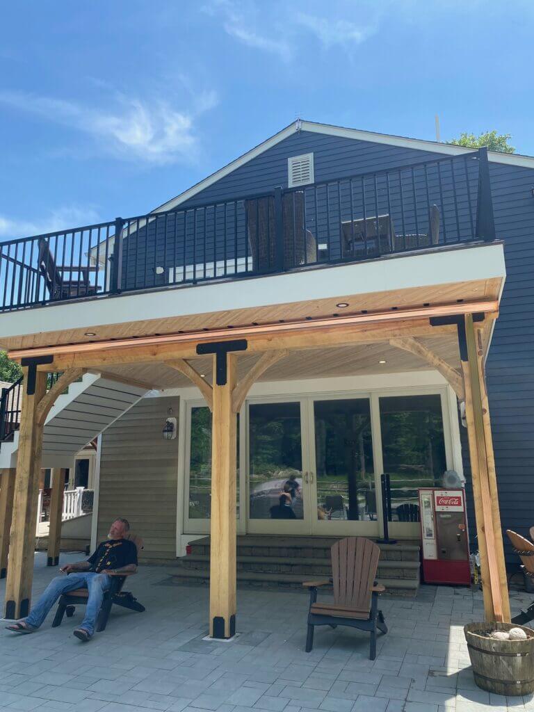 Custom timber pergola over an outdoor living area, built by Legion Build