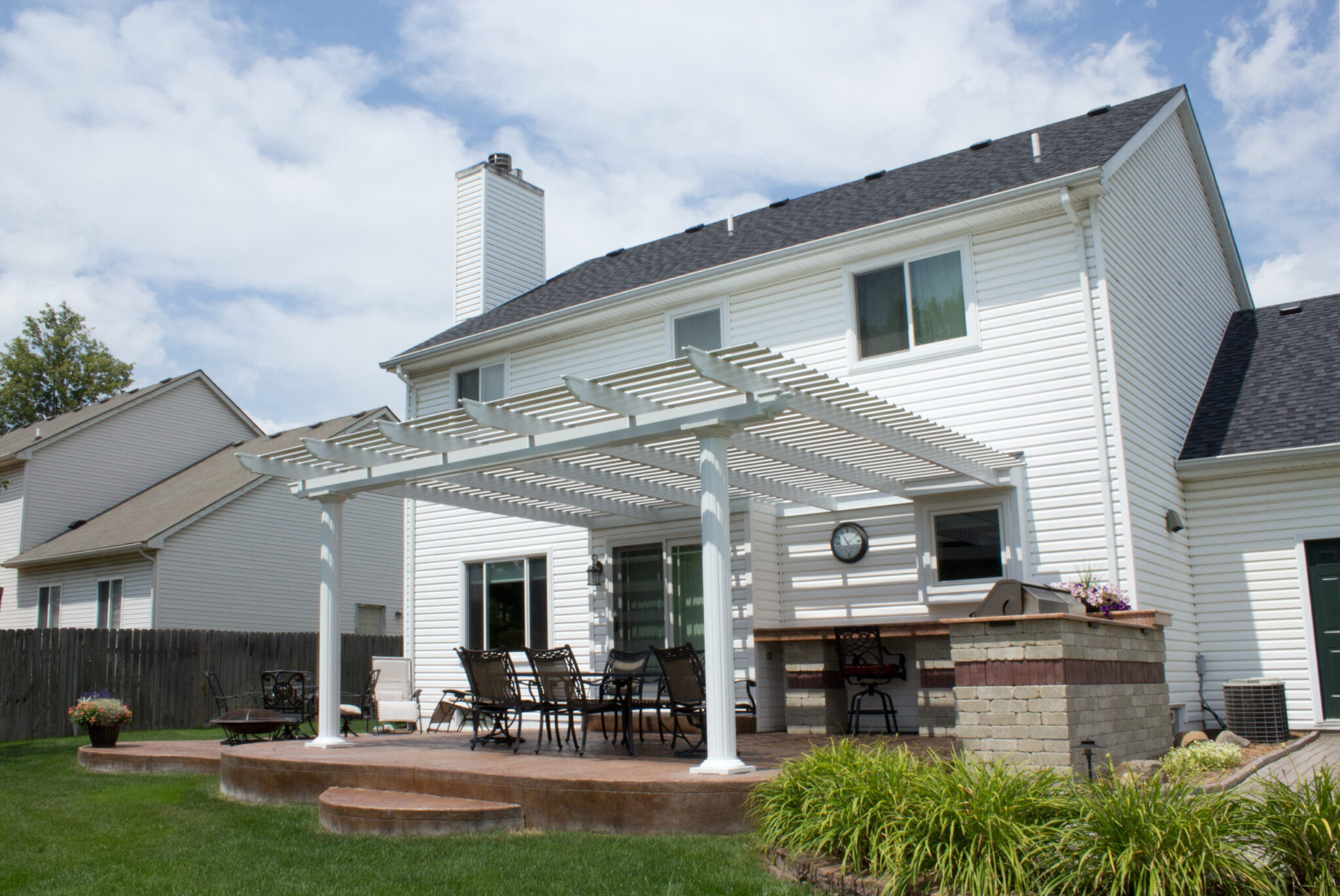 Attached white pergola on a New Jersey home
