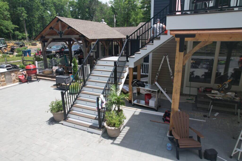 Backyard two-level deck built by Legion Build in Union, NJ