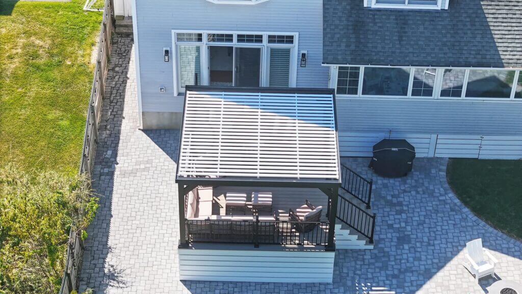 Custom deck with louvered pergola in Toms River, NJ